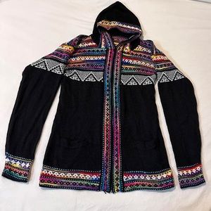 Black knitted zip up sweater purchased in Mexico
traditional tribal print